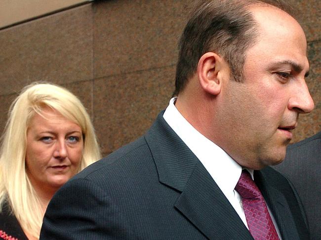 Tony Mokbel (centre) with his legal team Nicola Gobbo (left) and Con Heliotis QC (right) outside court.