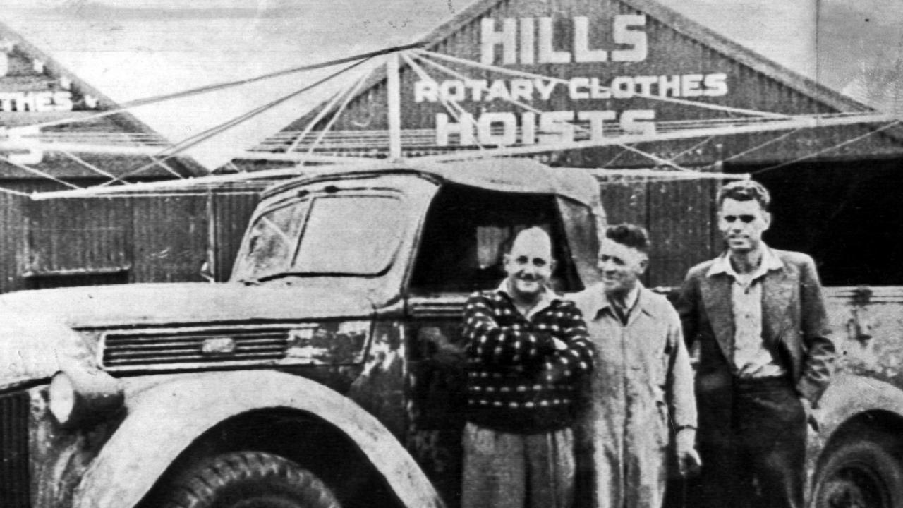 Lance Hill (centre) with business partner and brother-in-law Harold Ling (left) and mechanic Jack Short at his Hills rotary clothes hoist factory in Adelaide circa 1946.