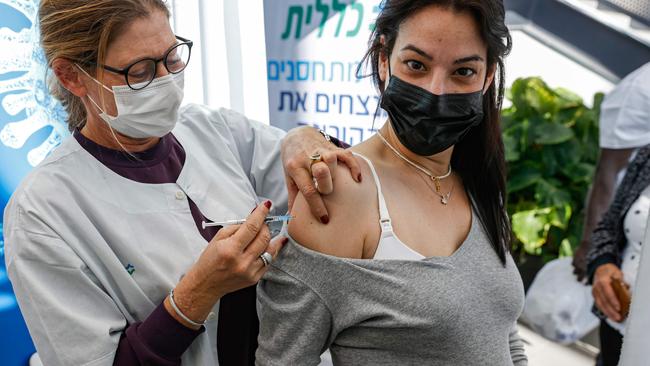 A pregnant woman receives the Pfizer vaccine from Clalit Health Services in Tel Aviv at the weekend. Picture: AFP