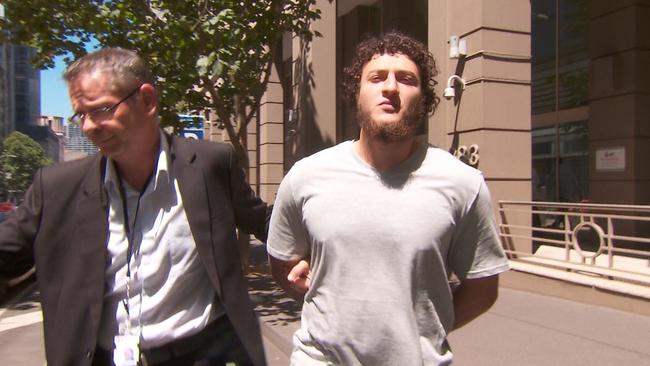 One of the men arrested in Melbourne terror raids Ahmed Mohamed leaves AFP HQ. Picture Nine News.