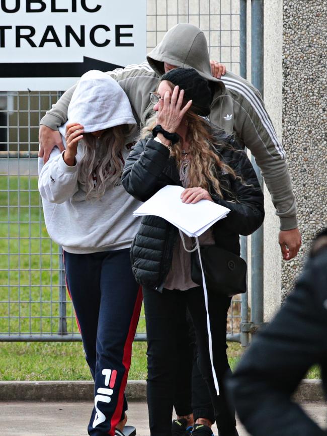 Goodwin (left) leaving Campbeltown police station on Monday. Picture: Adam Yip