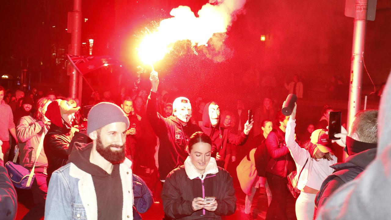 Anti-lockdown protesters lit flares on Thursday night. Picture: Matrix