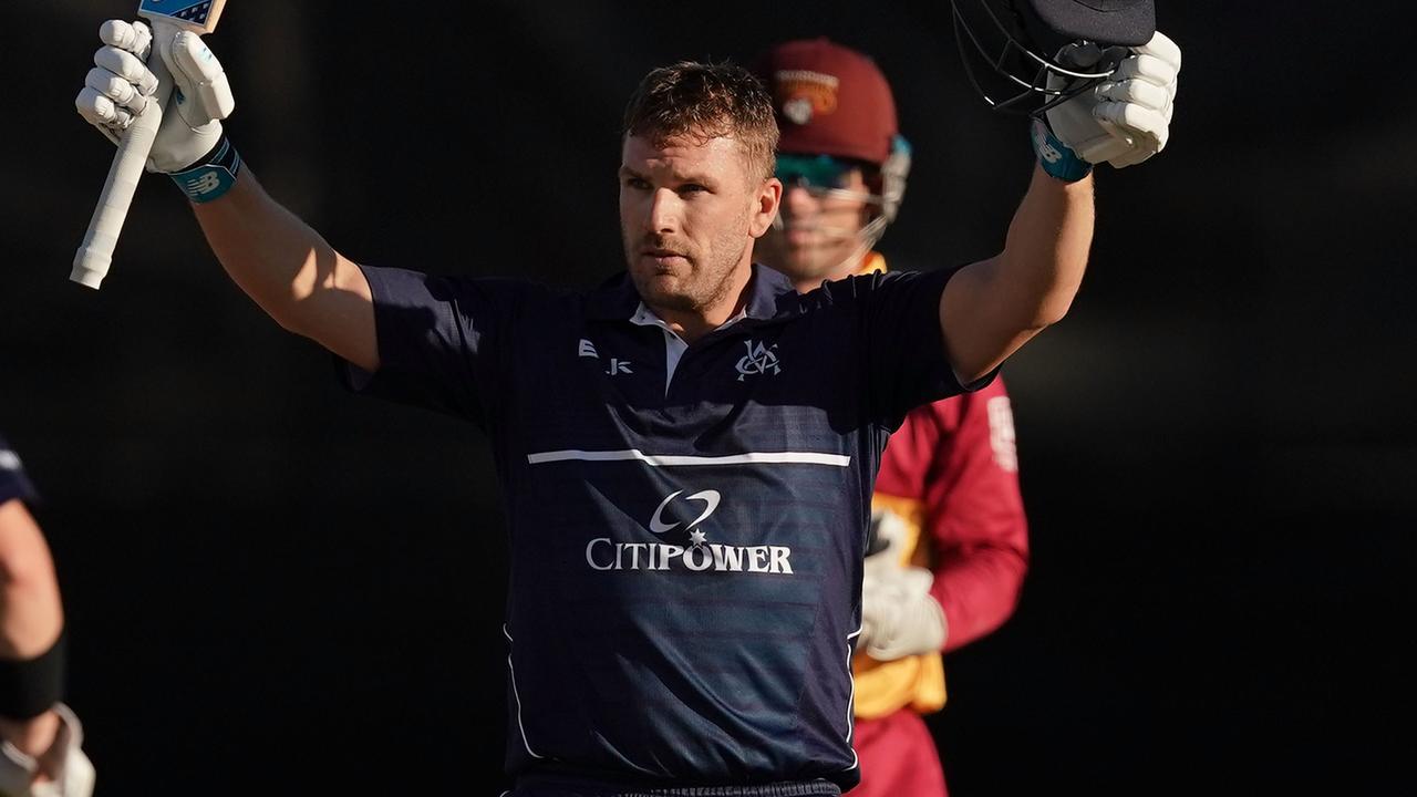 Aaron Finch of Victoria celebrates after hitting the winning runs during the Marsh One-Day Cup Cricket match between Victoria and Queensland.