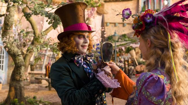 Johnny Depp, left, and Mia Wasikowska appear in a scene from Alice Through The Looking Glass. Picture: Peter Mountain/Disney