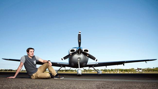 Determined: Lachlan Smart, 18, with his Cirrus plane at Sunshine Coast Airport. Picture: Eddie Safarik