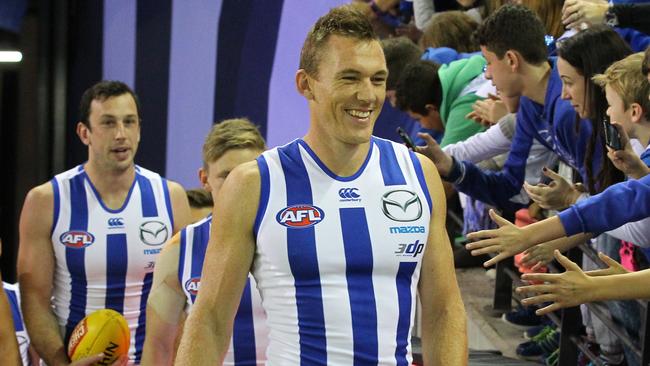 Drew Petrie walks out onto the field for his 300th game for North Melbourne.