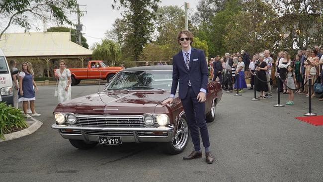 Students arriving in style for the 2024 Glasshouse Christian College formal at Flaxton Gardens.