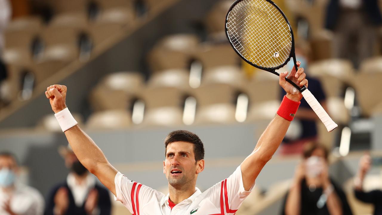 PARIS, FRANCE - JUNE 11: Novak Djokovic of Serbia celebrates after winning match point during his Men's Singles Semi Final match against Rafael Nadal of Spain on day Thirteen of the 2021 French Open at Roland Garros on June 11, 2021 in Paris, France. (Photo by Julian Finney/Getty Images)