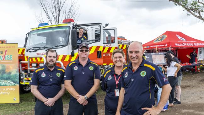 Justin Donohoe, Scott Bulmer, Cassy Semken, Jody Preston, and Kara Bulmer (in the truck) from the Wallacia Rural Fire Service. Picture: AAP/Matthew Vasilescu