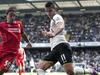 Tottenham Hotspur's Erik Lamela, right, vies for the ball with Liverpool's Lazar Markovic, during their English Premier League soccer match at White Hart Lane, London, Sunday, Aug. 31, 2014 (AP Photo/Bogdan Maran)