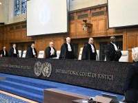 THE HAGUE, NETHERLANDS - JANUARY 12: Judges take their seats prior to the hearing of Israel's defense at the International Court of Justice (ICJ) against South Africa's genocide case in Gaza against Israel on January 12, 2024, in the Hague, Netherlands. On day one of the trial, South Africa presented hard evidence in the case it filed on Dec. 29, accusing Israel of genocide and violations of the UN Genocide Convention with its actions in the Gaza Strip since Oct. 7. (Photo by Dursun Aydemir/Anadolu via Getty Images)