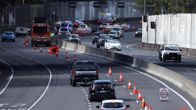 Police check vehicles on the M4 motorway heading towards the Sydney city centre. Picture: AFP