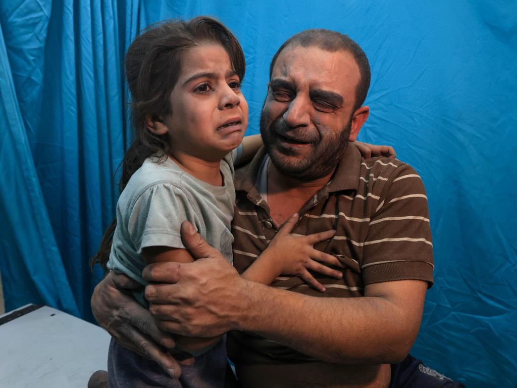 Palestinians injured in an Israeli air strike await treatment at the Nasser hospital in Khan Yunis in the southern of Gaza Strip. Picture: AFP