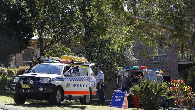 Police in the garden of the house where William Tyrrell went missing in Kendall. Picture: David Moir