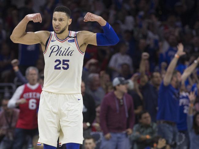 PHILADELPHIA, PA - MAY 5: Ben Simmons #25 of the Philadelphia 76ers flexes while the fans react to a dunk by Joel Embiid in the second quarter against the Boston Celtics during Game Three of the Eastern Conference Second Round of the 2018 NBA Playoff at Wells Fargo Center on May 5, 2018 in Philadelphia, Pennsylvania. NOTE TO USER: User expressly acknowledges and agrees that, by downloading and or using this photograph, User is consenting to the terms and conditions of the Getty Images License Agreement.   Mitchell Leff/Getty Images/AFP == FOR NEWSPAPERS, INTERNET, TELCOS & TELEVISION USE ONLY ==