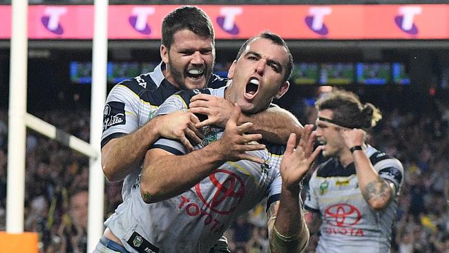 Kane Linnett of the Cowboys celebrates with Lachlan Coote.