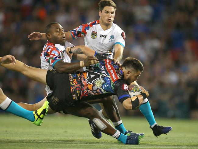 Jack Bird dives over to score the first try for the Indigenous All Stars.