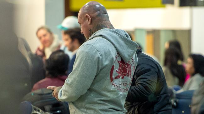 Mick Murray in the check-in at Melbourne Airport.