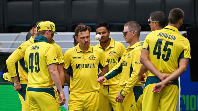 Australia's players gather. Photo by Ryan Lim / AFP.