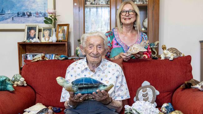 January 2, 2025: Jack Turner, 101, with friend Jan, is an ardent collector of turtles with just some of the 300 turtles he has collected.  Picture: Kelly Barnes