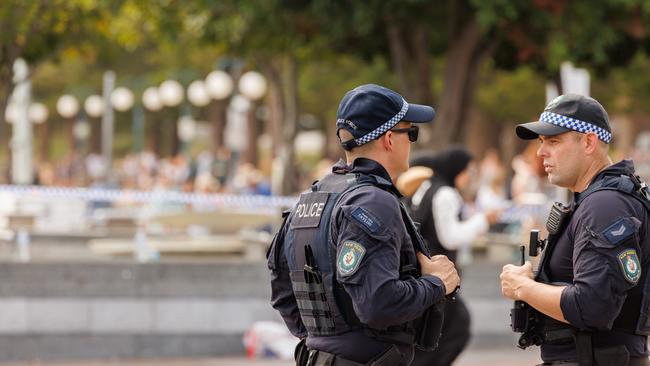 Police in Manly after an unrelated brawl earlier on Australia Day. Picture: Tim Pascoe