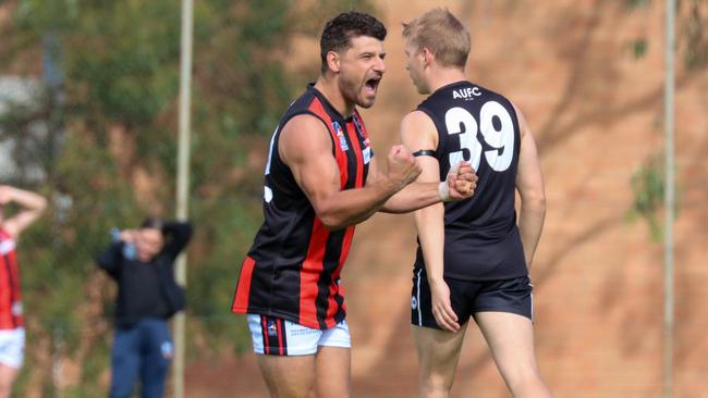 Shannon Snook celebrates a goal for Rostrevor Old Collegians in its win over Adelaide University on Saturday. Picture: Brayden Goldspink