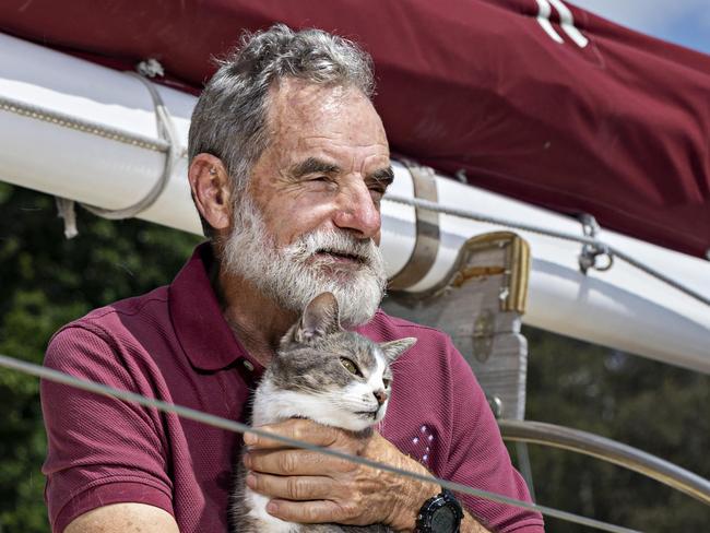 SYDNEY, AUSTRALIA, NOVEMBER 22, 2023. Sylph VI skipper and owner Robert âBobâ Williams with his cat Oli who will sail with Bob in the Sydney to Hobart yacht race on board Sylph VI. Photographer: Adam Yip