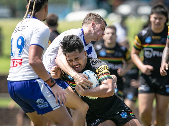 Poutoa Hotere-Papalii is hit hard in a tackle. Picture: Julian Andrews