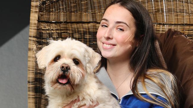 Double lung transplant recipient Savannah Fretwell 17, at home in Mudjimba with her dog Maxx. Photo: Lachie Millard.