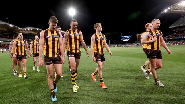 The Hawks leave Adelaide Oval after giving the Crows their first win of the season. Picture: James Elsby/AFL Photos via Getty Images