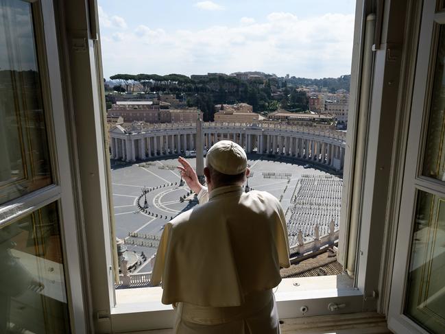 Pope Francis blessing over an empty St. Peter’s Square at the Vatican. Picture: Vatican Media/AFP