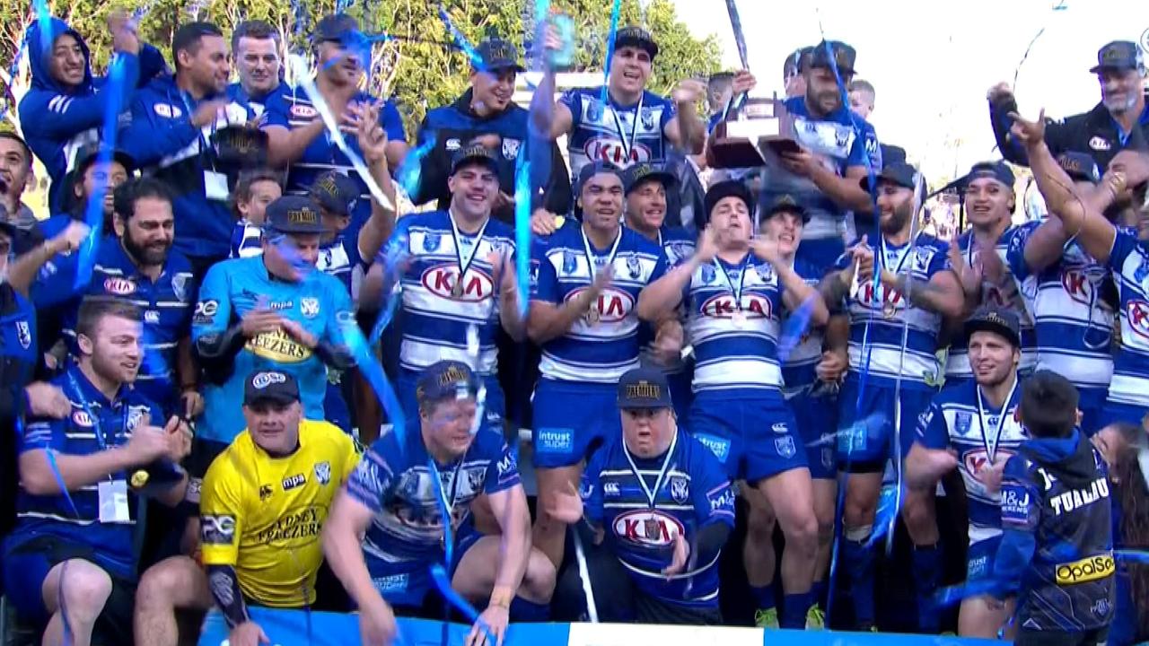 Bulldogs celebrate after being the Newtown Jets in the 2018 Intrust Super Premiership grand final.