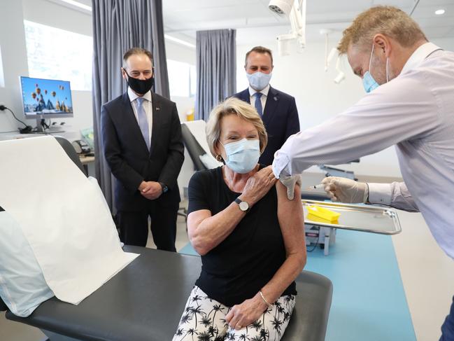 Health Minister Greg Hunt watches Dale Austin receive her COVID vaccine shot as he visits the Bluff Rd Medical Centre in Sandringham. Picture: NCA NewsWire / David Crosling