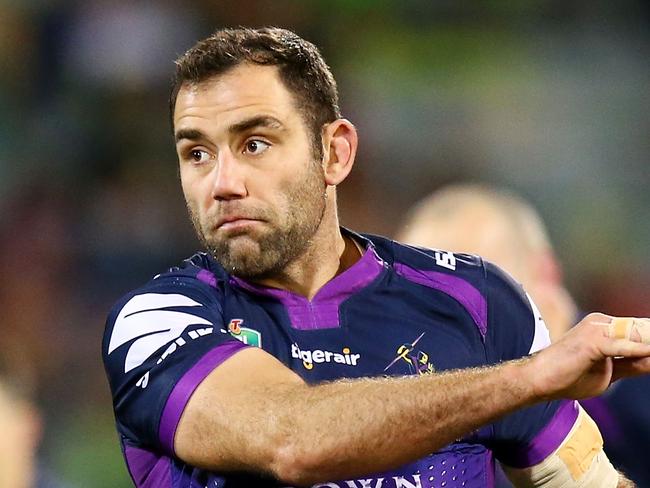 CANBERRA, AUSTRALIA - JULY 22: Cameron Smith of the Storm kicks ahead during the round 20 NRL match between the Canberra Raiders and the Melbourne Storm at GIO Stadium on July 22, 2017 in Canberra, Australia.  (Photo by Mark Nolan/Getty Images)