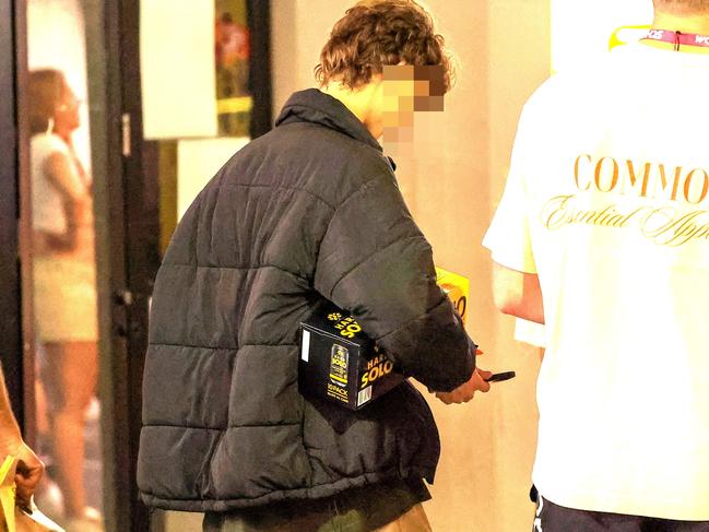 Young men at Schoolies are toting around the cartons like trophies. Picture: Media Mode/news.com.au.