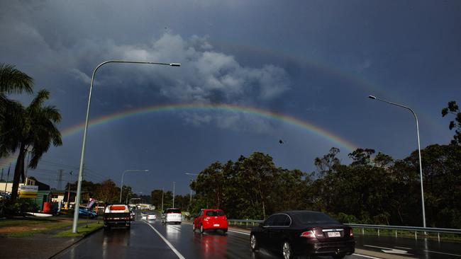 A rainbow over Sumner after the first storm eased Tuesday afternoon. Picture: Lachie Millard