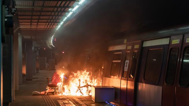 A fire is seen at an MTR station during as protests continue. Picture: Anthony Kwan/Getty