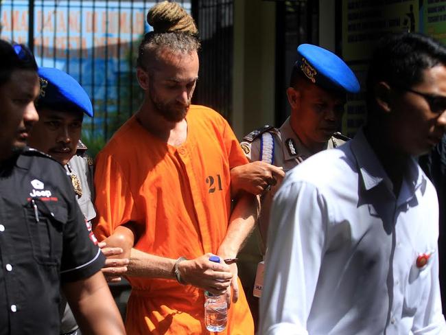 British man David Taylor escorted from a cell for interrogation. Picture: Lukman S. Bintoro