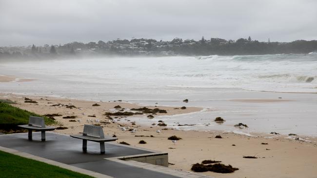 Popular tourist beach Mollymook was mostly abandoned on Thursday March 3, due to severe weather conditions. Picture: Nathan Schmidt