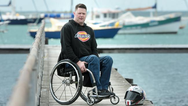 David Cook was riding his motorbike on the Great Ocean Road when he had a life changing accident. Pictured with the helmet he was wearing on the day. Picture: Alison Wynd