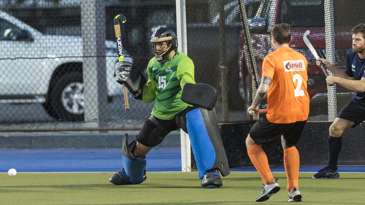 Stafford Strikers keeper Daniel Burge makes a save against HSR Hot Shots in Club Glenvale Challenge round five men's hockey at Clyde Park. Picture: Kevin Farmer