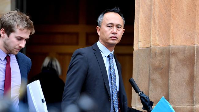 John Joshua Waldron, right, leaves the Adelaide Magistrates Court. Picture: AAP/Sam Wundke.