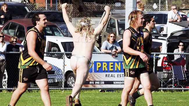 A Simon Goosey supporter streaks onto the ground after he kicked 100 goals in 2006. Picture: Guy Thayer