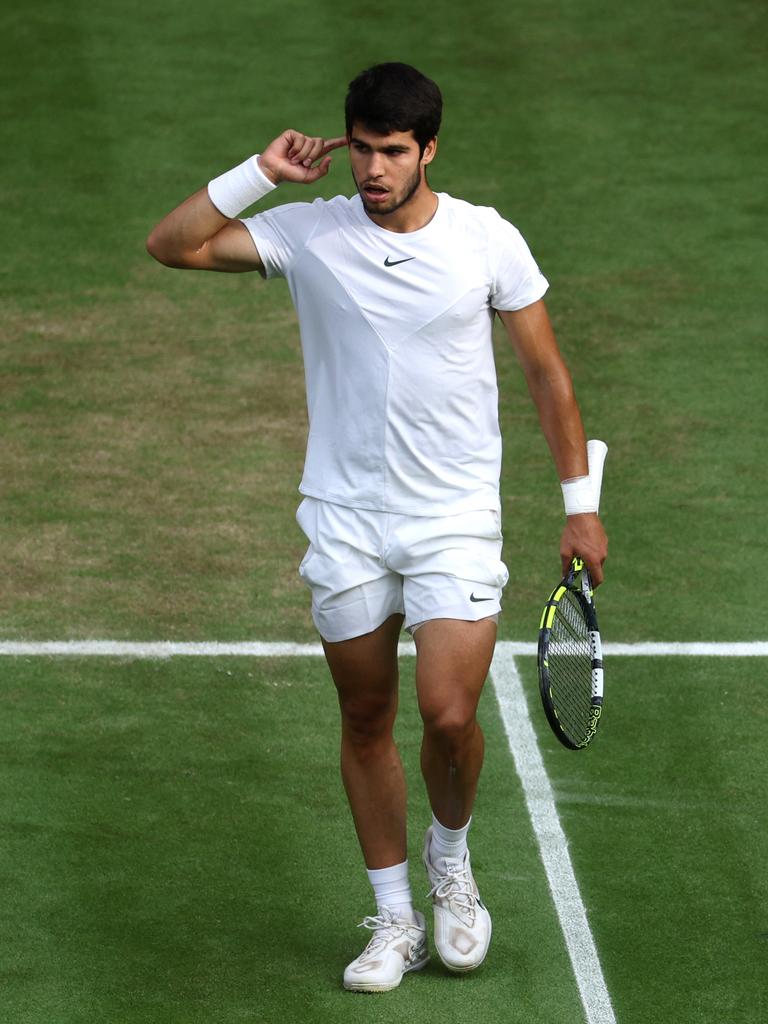 Carlos Alcaraz celebrates a break in the fifth. (Photo by Patrick Smith/Getty Images)