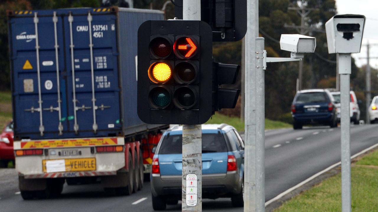 Queensland motorists seeing red by little-known law for running amber lights