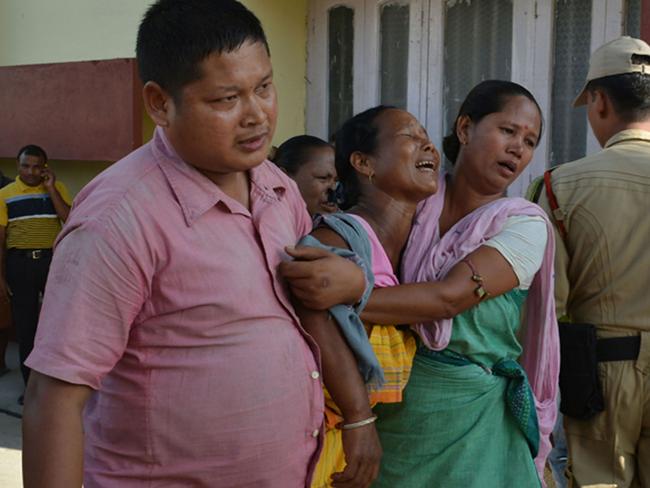 Relatives of a victim of the horrific rampage mourn at a hospital in the Kokrajhar district of northeastern Assam. Picture: AFP