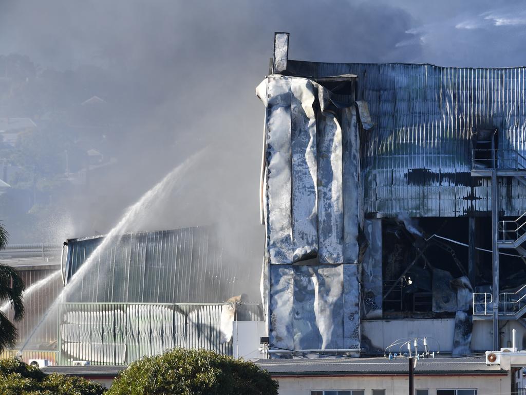 Emergency services work on a large fire burning at the Thomas Foods Murray Bridge abattoir factory. Picture: David Mariuz