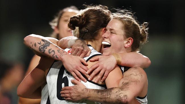 Jordan Allen and Jaimee Lambert celebrate a Magpies’ goal. Picture by Michael Klein