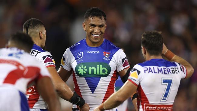 Jacob Saifiti of the Knights celebrates with teammates at full-time. Picture: Getty Images