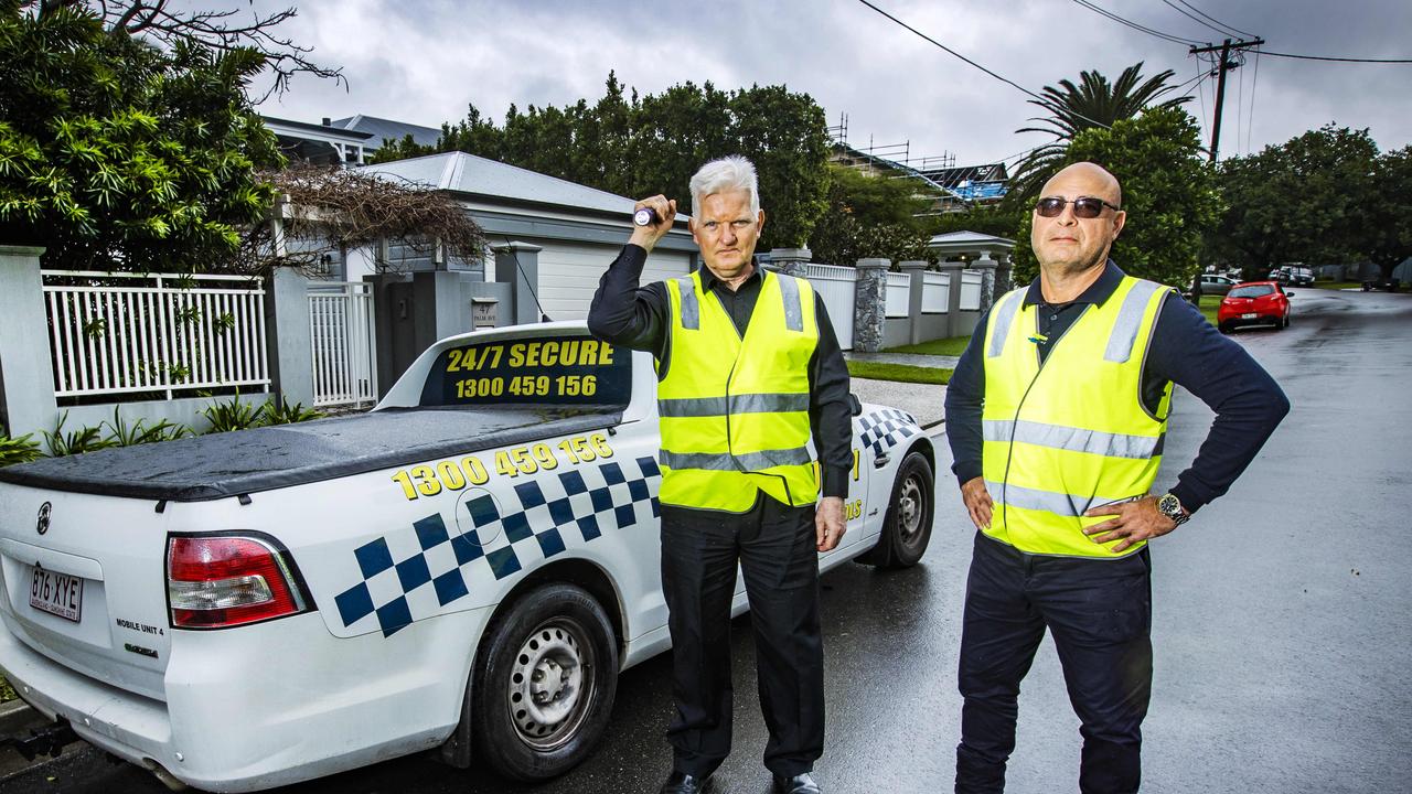 The 24/7 Group’s Stephen Walters and David Inman patrolling Clayfield streets. Picture: Nigel Hallett